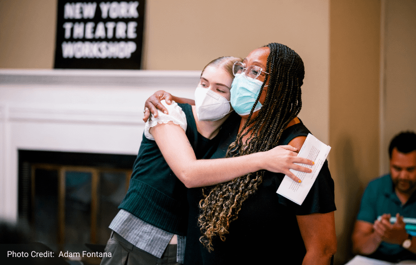 Diane J. Harris and Katelyn Seyl embracing